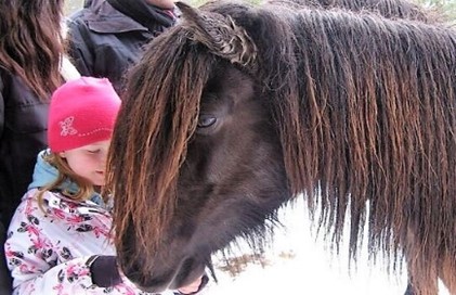 Ett barn och en häst